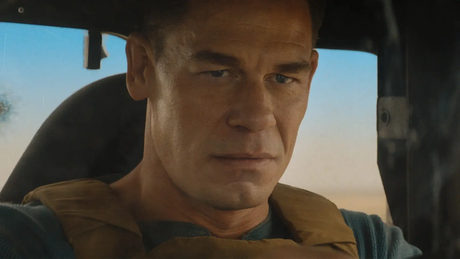 چهره آرنولد شوارتزنگر (Arnold Schwarzenegger) در صحنه‌ای از فیلم مچ‌باکس