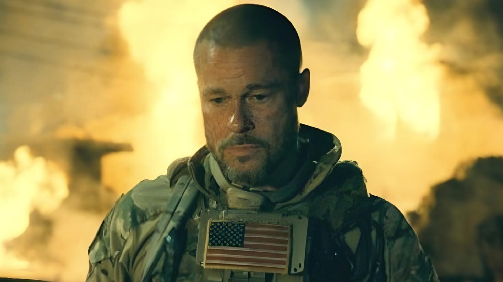 برد پیت (Brad Pitt) با لباس نظامی در میان شعله‌های آتش