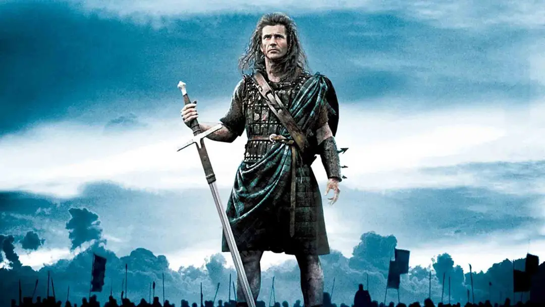 مل گیبسون در نقش ویلیام والاس با یک شمشیر در فیلم Braveheart