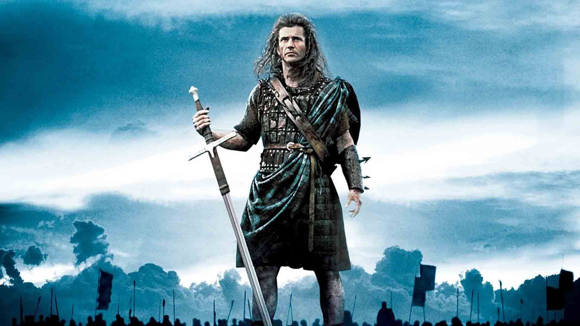 مل گیبسون در نقش ویلیام والاس با یک شمشیر در فیلم Braveheart