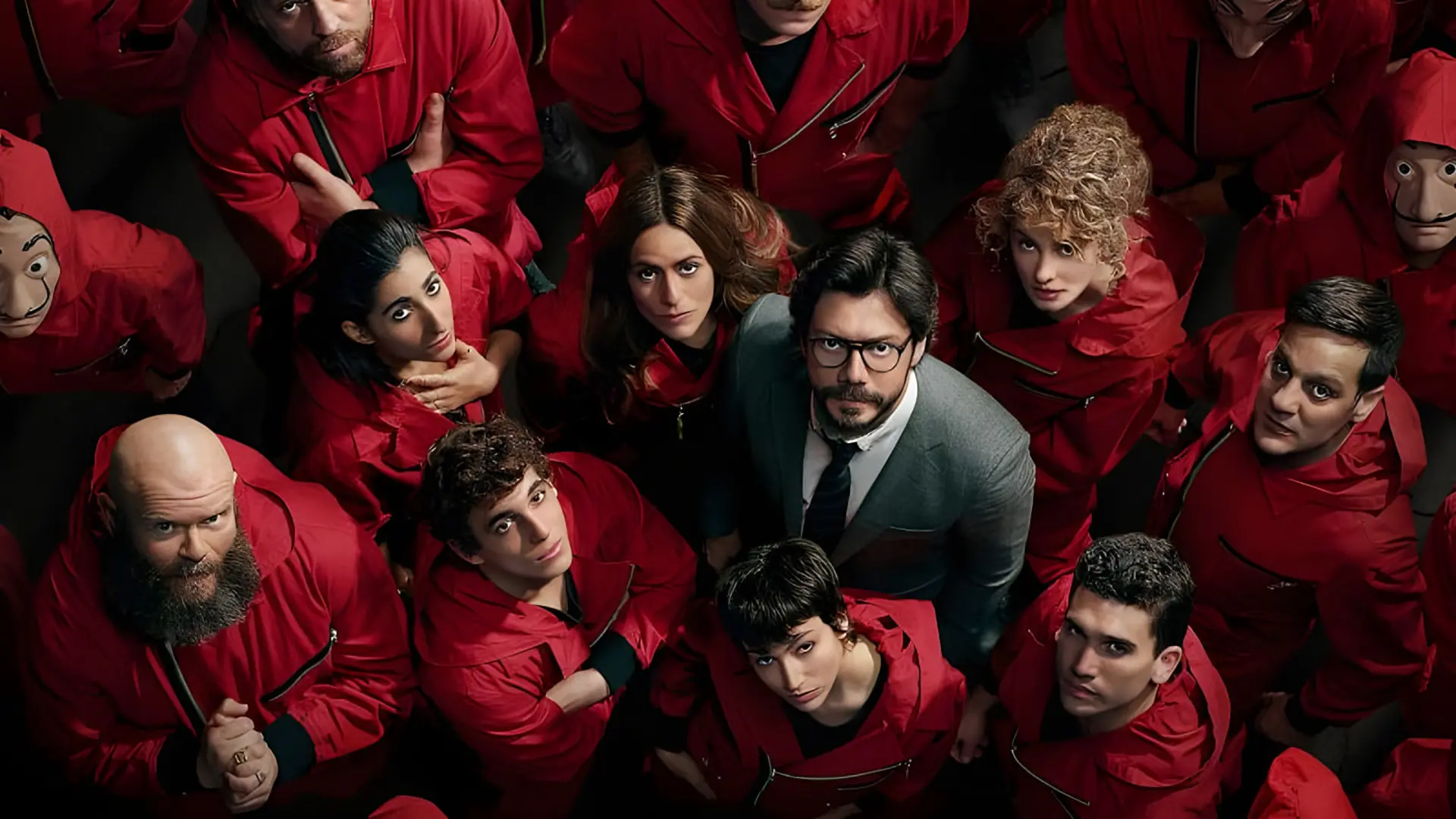 گروهی از بازیگران سریال خانه کاغذی (Money Heist) با لباس‌های قرمز