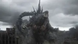 گودزیلا (Godzilla) در حال غرش در میان ویرانه‌های یک شهر تخریب‌شده