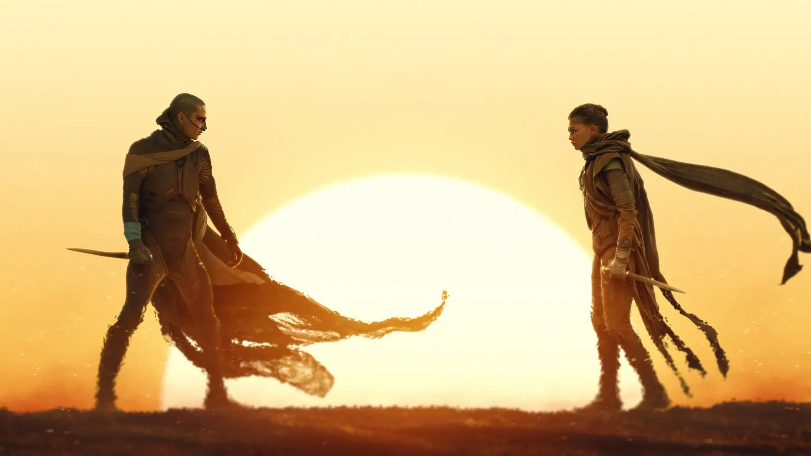 شخصیت‌های فیلم Dune: Part Three (Dune: Part Three) در مقابل خورشید در حال غروب