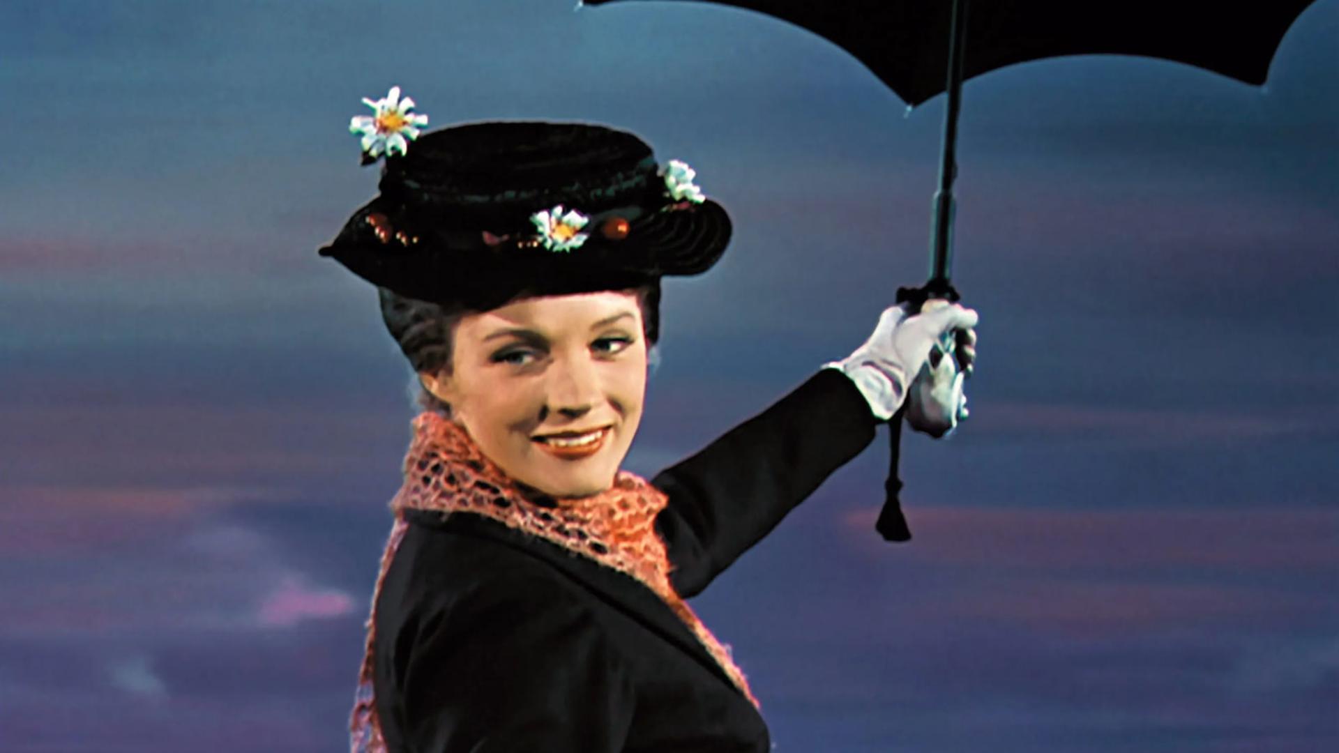 جولی اندروز (Julie Andrews) با کلاه گل‌دار و چتر سیاه در فیلم مری پاپینز