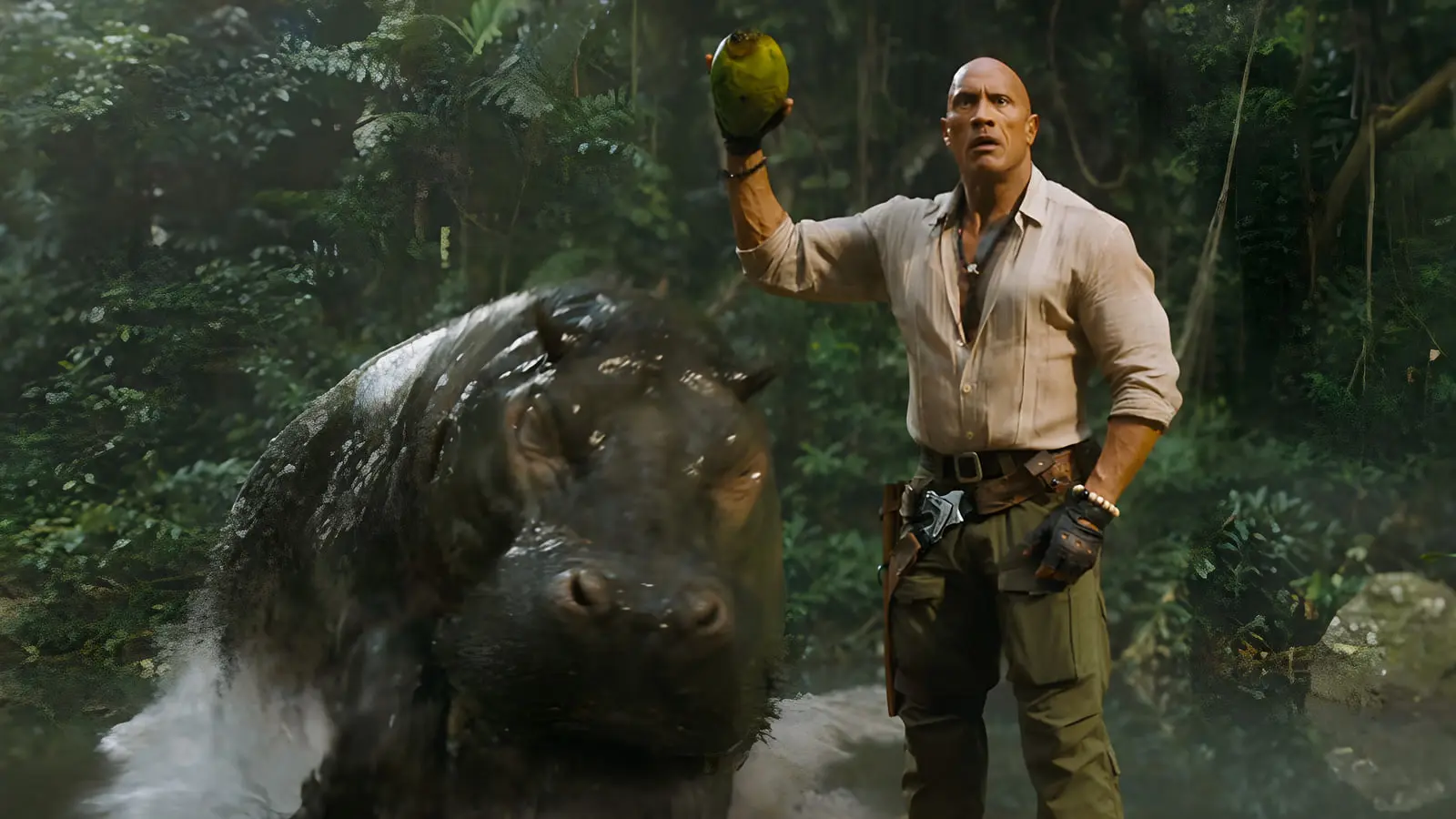 دواین جانسون (Dwayne Johnson) در میان جنگل در کنار یک اسب آبی بزرگ