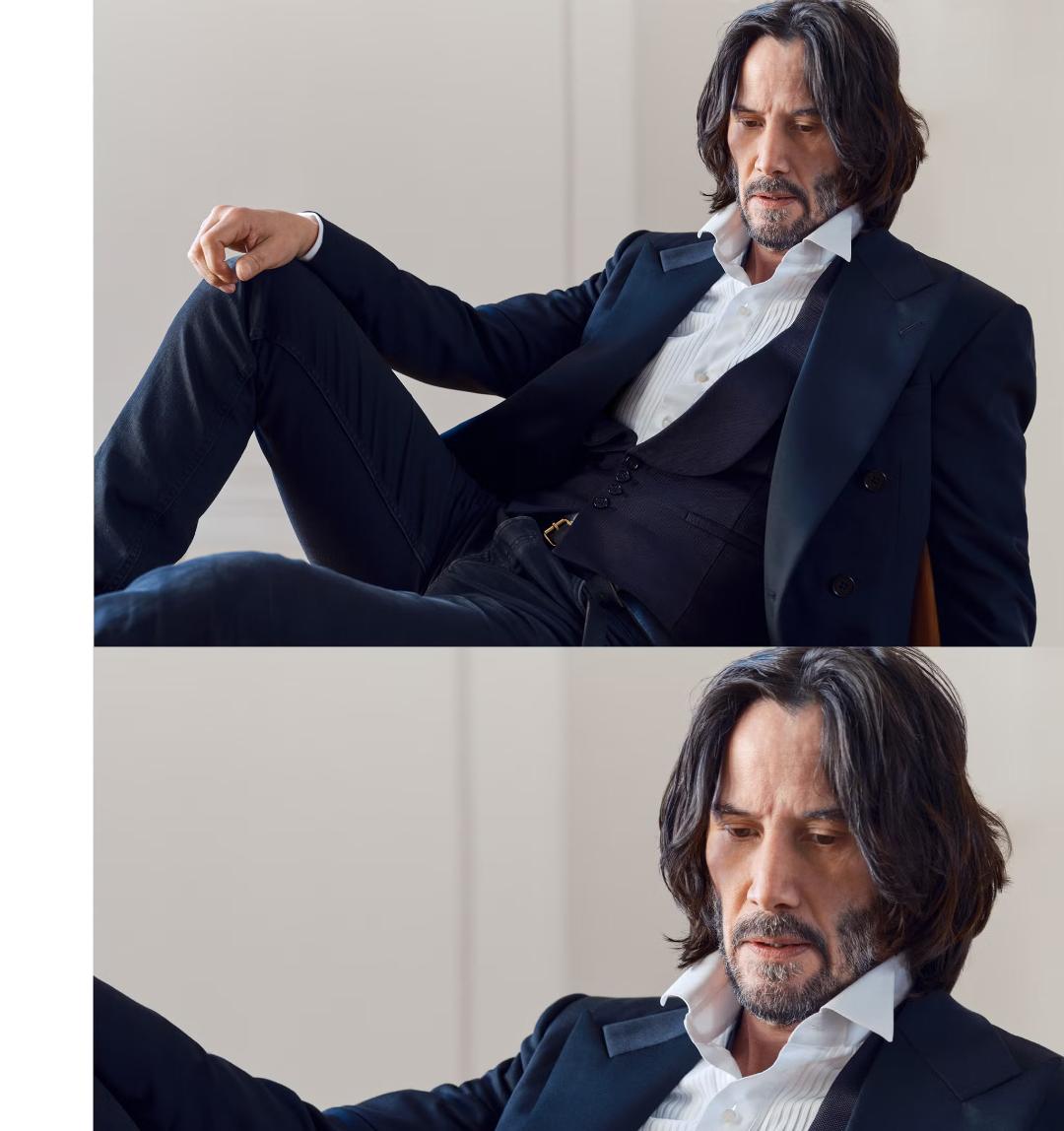 کیانو ریوز (Keanu Reeves) با کت و شلوار رسمی در یک فضای روشن