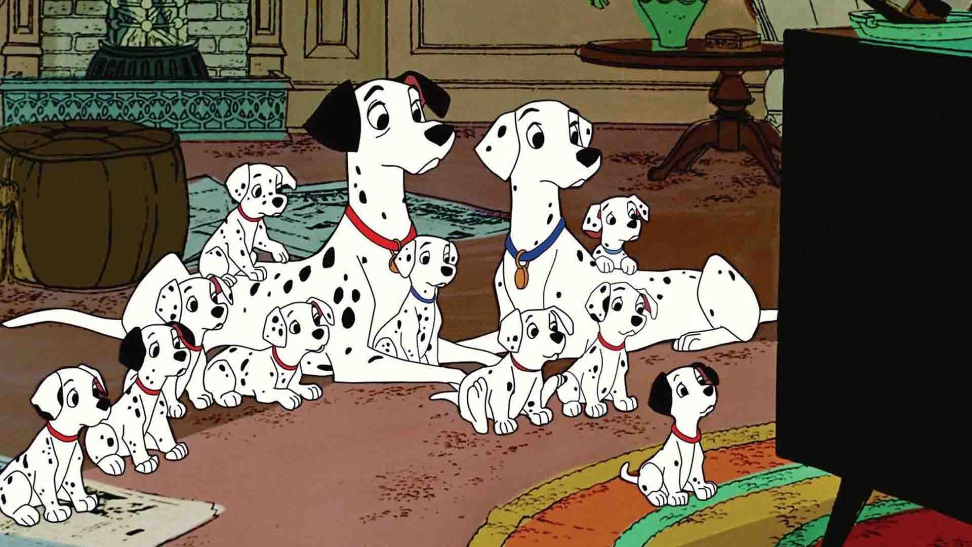 چند سگ دالمیشن مقابل تلویزیون در انیمیشن One Hundred and One Dalmatians