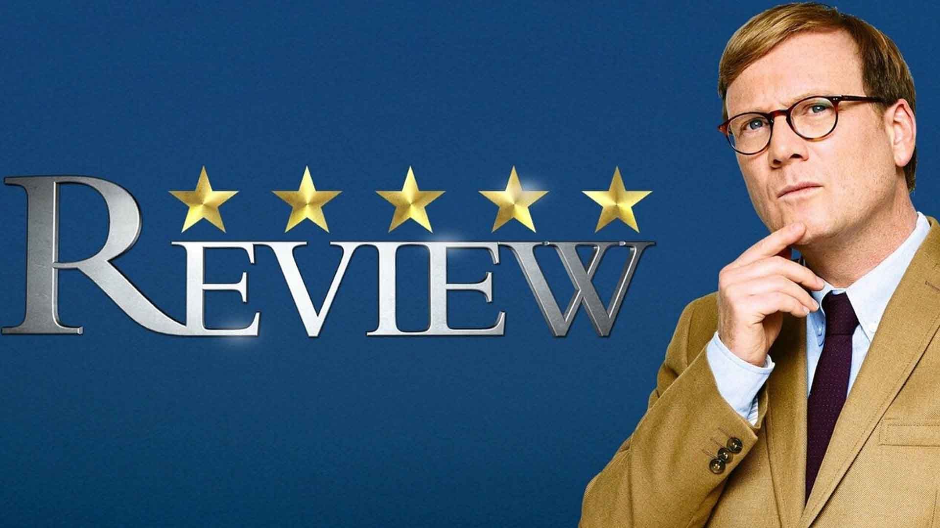 اندی دالی در نقش فارست مک‌نیل در سریال Review