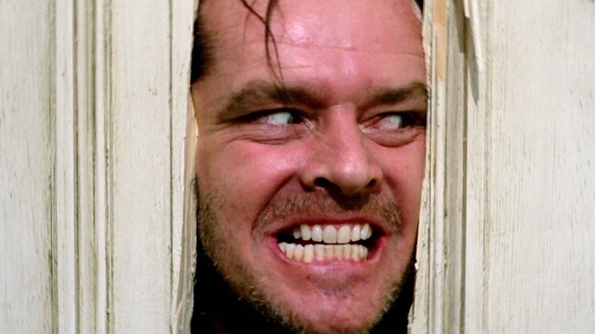 چهره جک نیکلسون بین در در فیلم The Shining